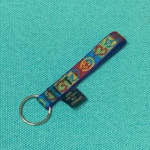 Rare New Lupine Peace Pup 1/2" wide Key Chain
